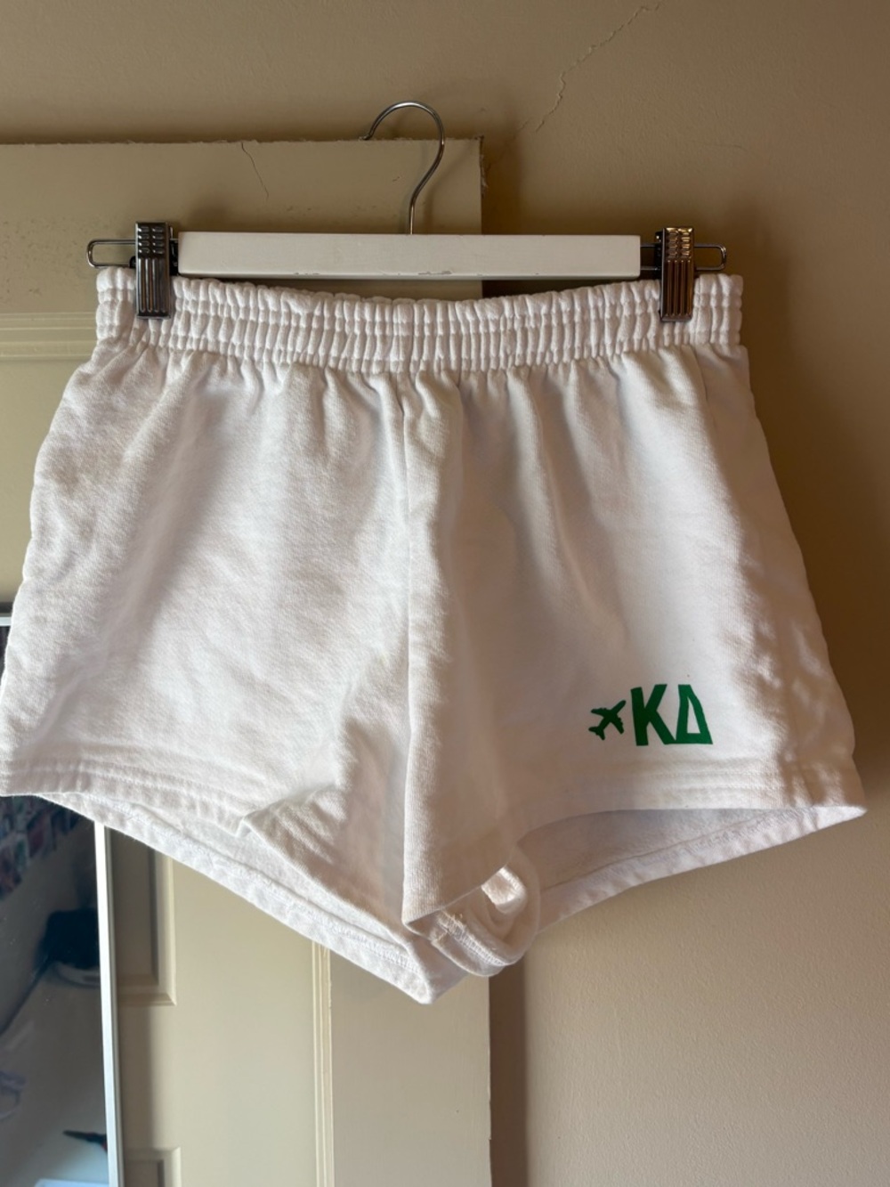 White Women’s Active Shorts with Green Logo